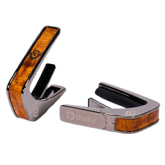 Thalia Guild Black Chrome Finish Capo - Koa With G Shield